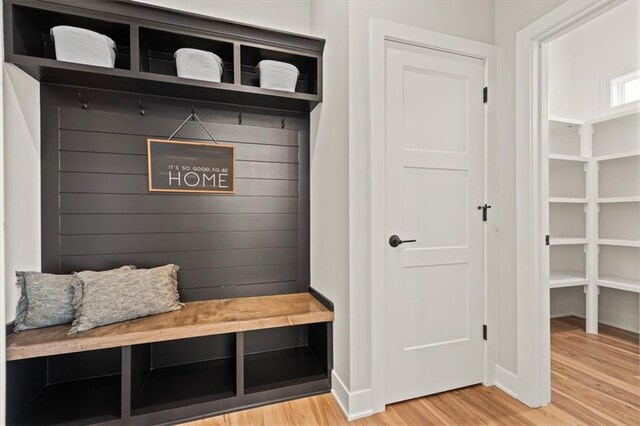 17163 S Laurelwood St, Olathe, KS 66062 - mudroom featuring wood finished floors and baseboards