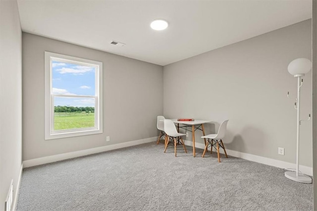 17163 S Laurelwood St, Olathe, KS 66062 - dining space featuring carpet and baseboards