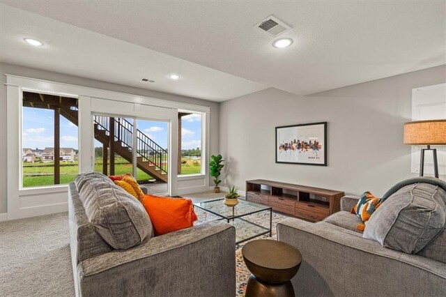 17163 S Laurelwood St, Olathe, KS 66062 - living room featuring carpet floors, recessed lighting, and baseboards