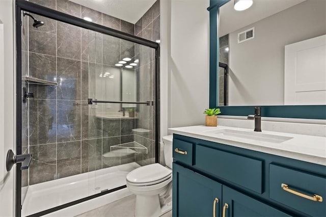 17163 S Laurelwood St, Olathe, KS 66062 - bathroom featuring toilet, vanity, and a shower stall