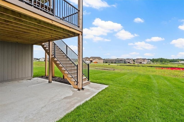 17163 S Laurelwood St, Olathe, KS 66062 - view of green lawn featuring stairs, a patio, and a wooden deck