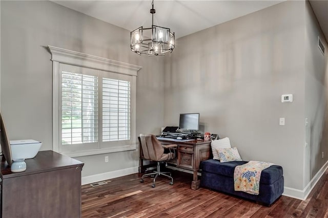 home office featuring baseboards, an inviting chandelier, dark wood-style floors, and visible vents