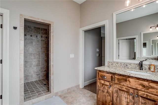 full bath with vanity and walk in shower