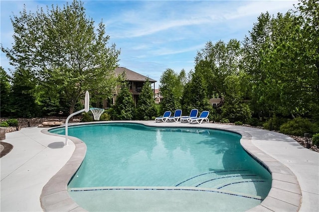outdoor pool featuring a patio area