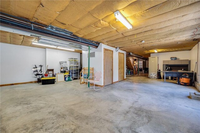 below grade area featuring baseboards