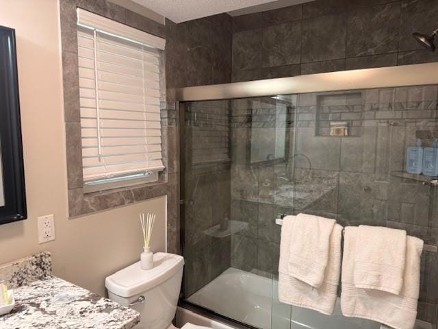 full bathroom with toilet and vanity
