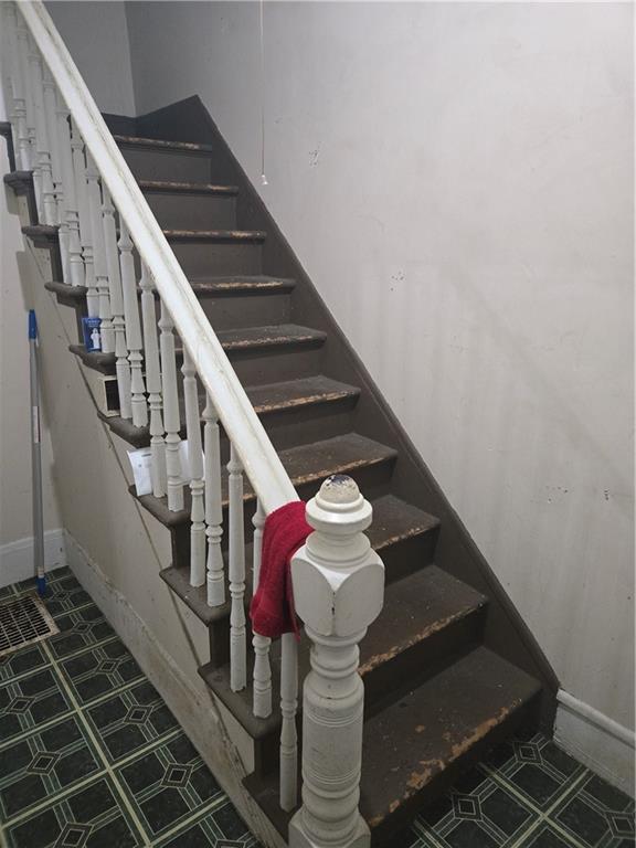staircase with baseboards