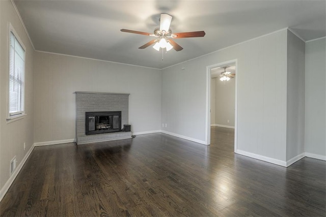 unfurnished living room featuring dark wood-style flooring, visible vents, ceiling fan, and crown molding
