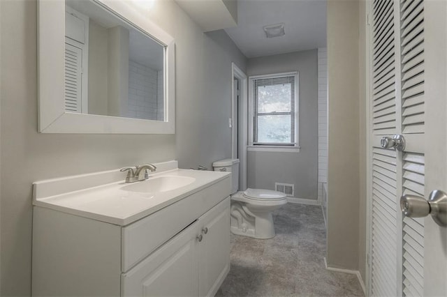 bathroom featuring toilet, visible vents, vanity, and baseboards