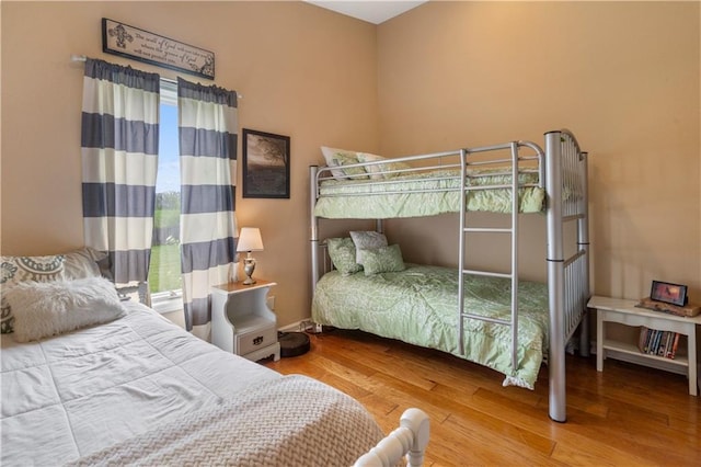 bedroom with wood finished floors