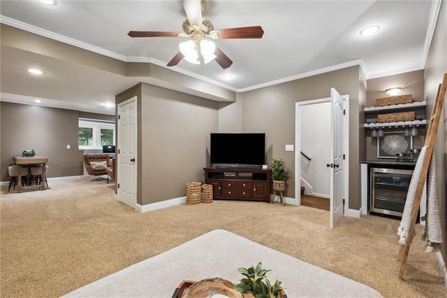 carpeted bedroom with wine cooler, crown molding, baseboards, recessed lighting, and ceiling fan