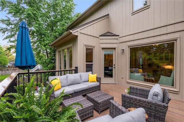 deck featuring outdoor lounge area