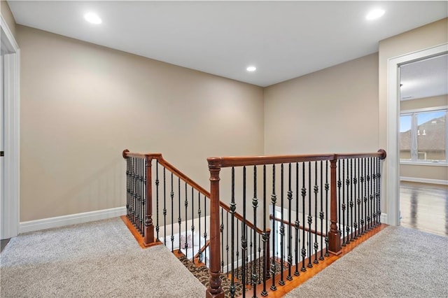 stairway featuring recessed lighting and baseboards
