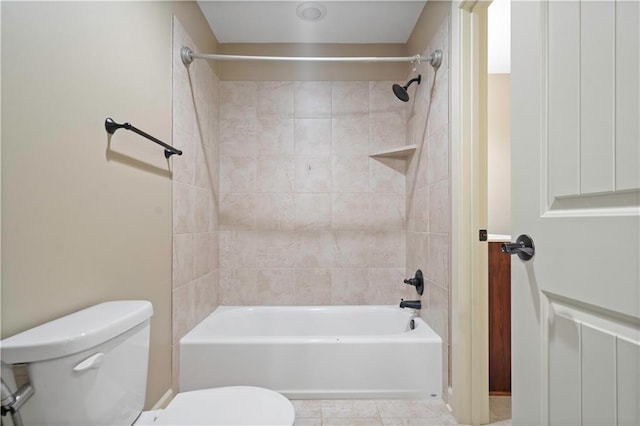 full bath with shower / bathing tub combination, toilet, and tile patterned floors