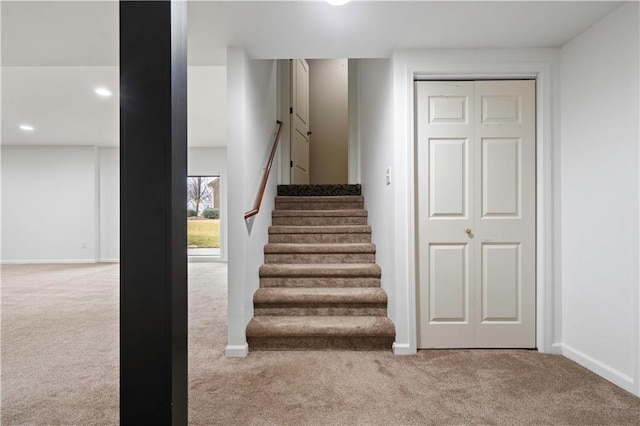 stairway with carpet, recessed lighting, and baseboards