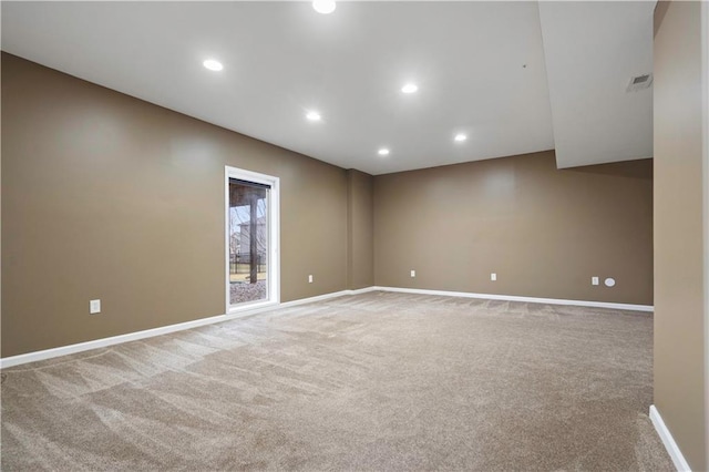 unfurnished room featuring visible vents, recessed lighting, carpet flooring, and baseboards