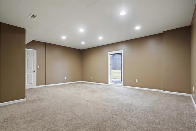 carpeted spare room with visible vents, recessed lighting, and baseboards