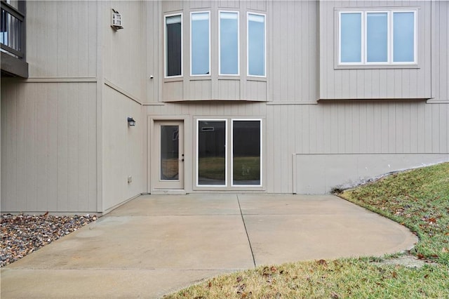 rear view of house featuring a patio
