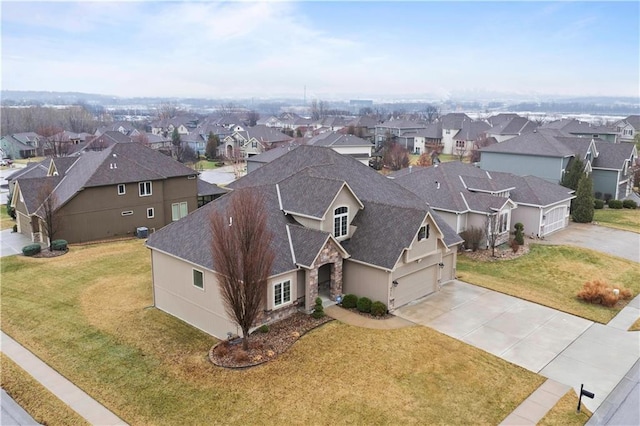 drone / aerial view with a residential view