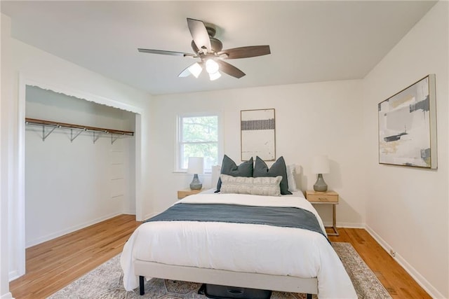4401 E 104th St, Kansas City, MO 64137 - bedroom featuring light wood-style flooring, ceiling fan, a closet, and baseboards