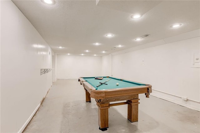 4401 E 104th St, Kansas City, MO 64137 - game room with finished concrete floors, recessed lighting, baseboards, billiards, and a textured ceiling