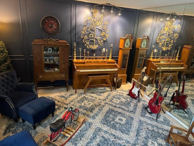 sitting room with a decorative wall