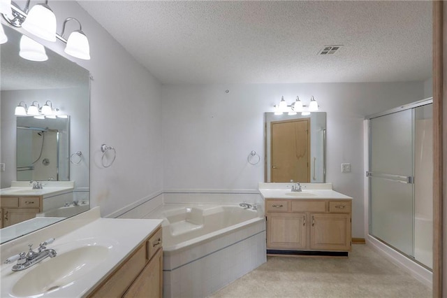 17800 E Bolger Rd Unit 245-A, Independence, MO 64055 - full bath featuring a textured ceiling, two vanities, a shower stall, and a garden tub