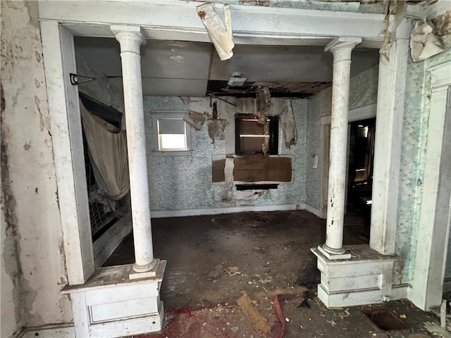 interior space featuring unfinished concrete floors