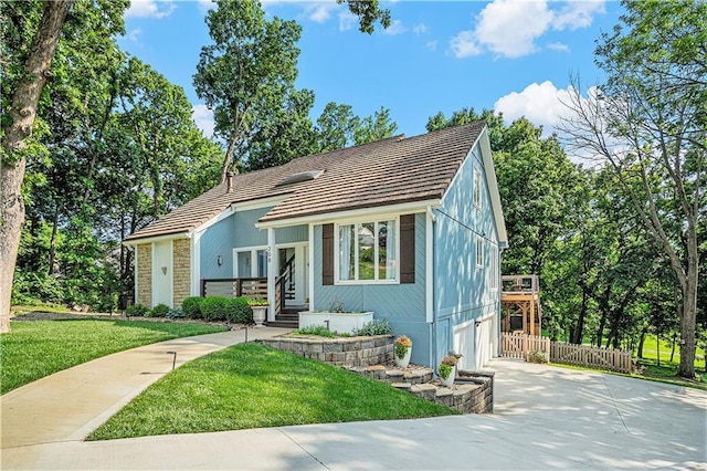 208 NE Landings Cir, Lees Summit, MO 64064 - view of front of home featuring concrete driveway and a garage