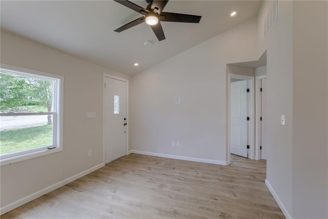 812 S Saville St, Independence, MO 64050 - foyer with vaulted ceiling, a ceiling fan, light wood-type flooring, baseboards, and recessed lighting