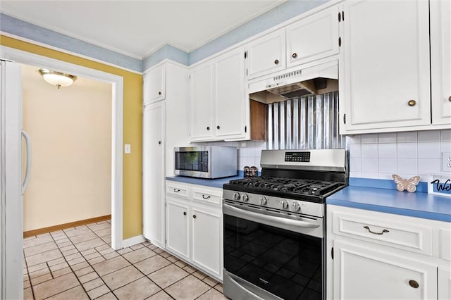 kitchen with backsplash, white cabinetry, appliances with stainless steel finishes, and under cabinet range hood