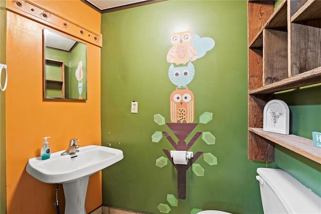 half bath featuring toilet