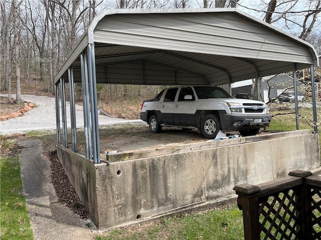 view of parking / parking lot featuring a carport