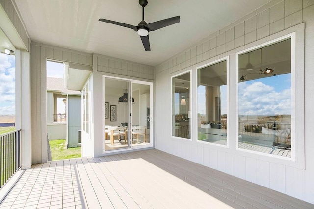 12541 S Hedge Ct, Olathe, KS 66061 - unfurnished sunroom featuring ceiling fan