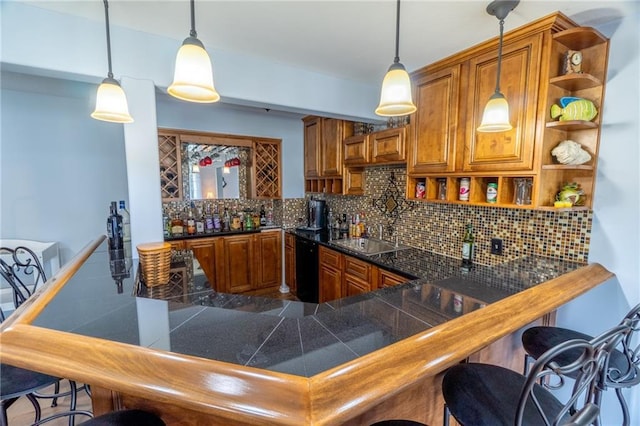 kitchen featuring open shelves, brown cabinets, and dark countertops
