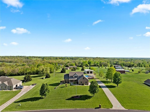 drone / aerial view with a view of trees