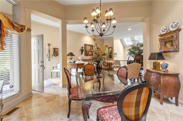 dining space featuring baseboards, ornamental molding, an inviting chandelier, and visible vents