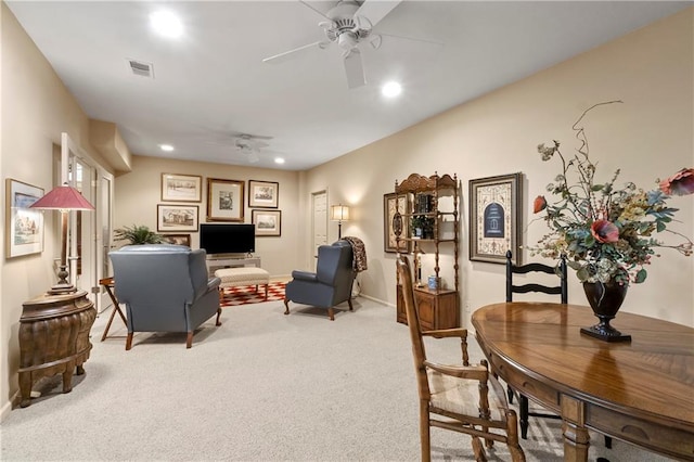 living area featuring a ceiling fan, recessed lighting, baseboards, visible vents, and carpet floors