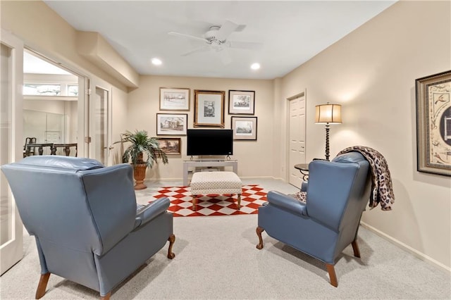 living room with carpet flooring, baseboards, a ceiling fan, and recessed lighting