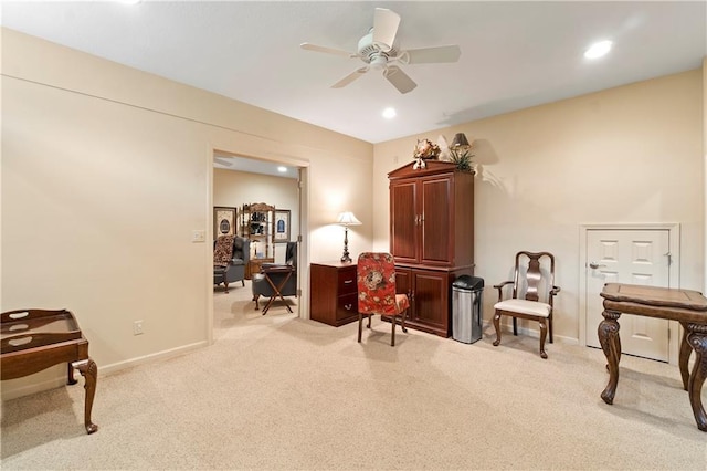 living area with light colored carpet, baseboards, a ceiling fan, and recessed lighting