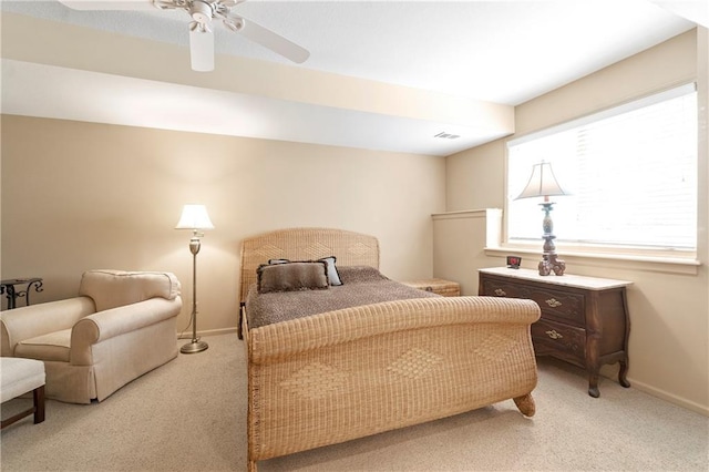 bedroom featuring baseboards and carpet floors