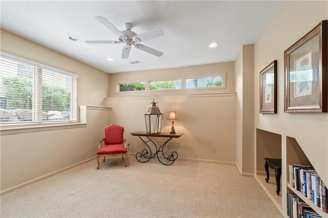 sitting room featuring carpet floors, a ceiling fan, visible vents, and recessed lighting