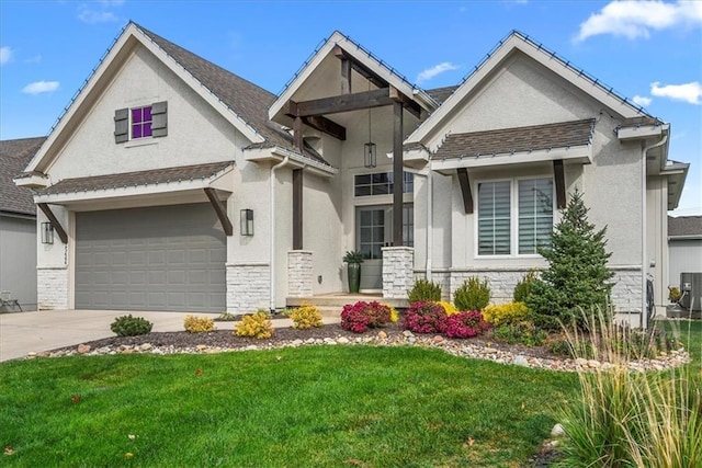 view of front facade featuring stucco siding, a front yard, driveway, and stone siding