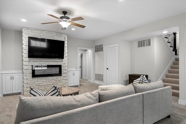 living area with carpet floors and visible vents