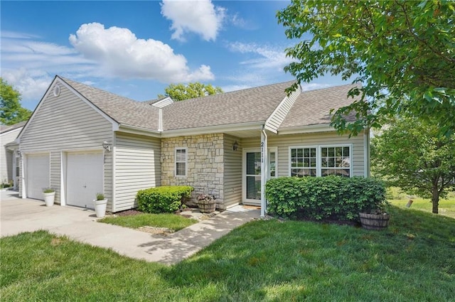 2111 N 83rd Pl, Kansas City, KS 66109 - view of front of property featuring an attached garage, a shingled roof, a front yard, driveway, and stone siding