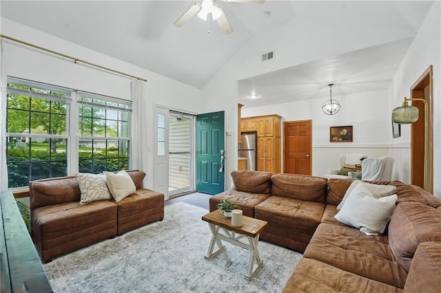 2111 N 83rd Pl, Kansas City, KS 66109 - living room featuring a ceiling fan and lofted ceiling