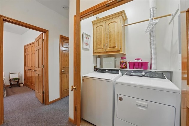 2111 N 83rd Pl, Kansas City, KS 66109 - laundry room with cabinet space, washer and clothes dryer, and carpet floors