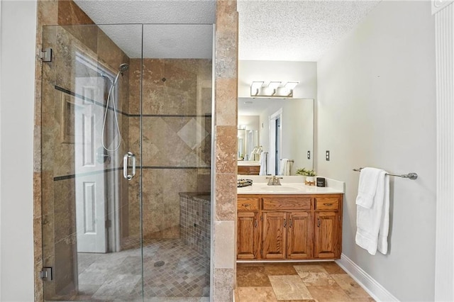 1125 SW Hillcrest Dr, Blue Springs, MO 64015 - bathroom with vanity, a stall shower, and a textured ceiling