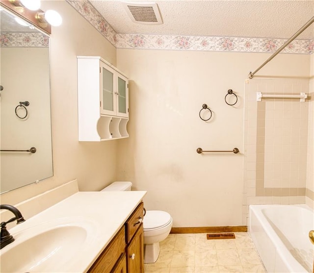 full bath featuring toilet, a textured ceiling, visible vents, and vanity