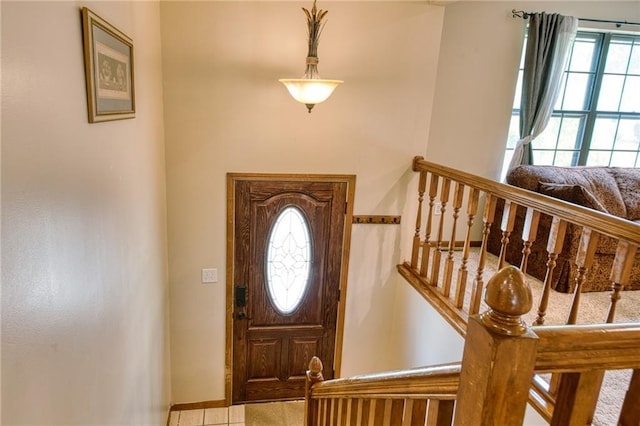 2109 NW Hidden Pointe Ct, Blue Springs, MO 64015 - foyer entrance featuring healthy amount of natural light and stairs